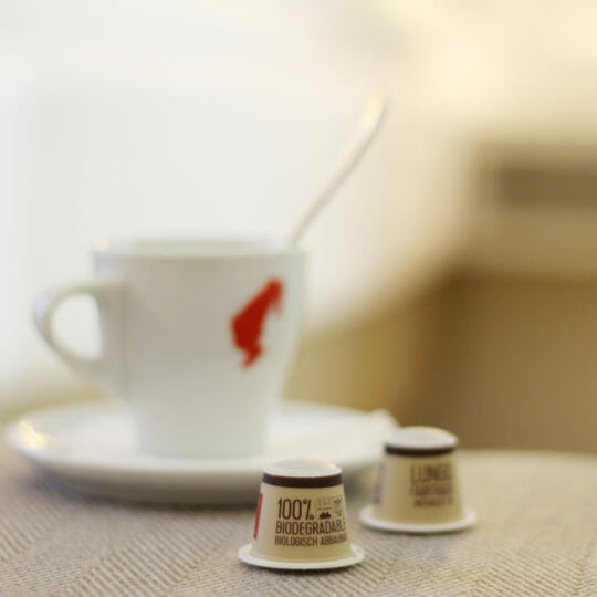 Sustainable Fairtrade coffee capsules in the room
